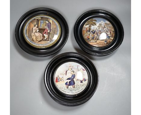 Seven Prattware pot lids, mounted in ebonised wood frames, an F &amp; R Pratt plate and two pot lids with bases
