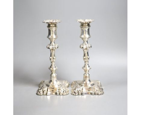 A pair of Victorian silver candlesticks, Henry Wilkinson &amp; Co, London, 1867, (a.f.) 23.7cm, weighted.