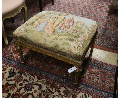 An 18th century style rectangular giltwood dressing stool with tapestry seat