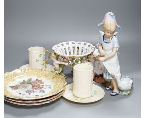 A pair of Belleek "Shamrock" pattern tea cups and saucers, Royal Copenhagen group of a girl and geese, two Worcester plates, 