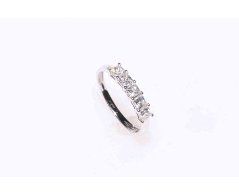 14 carat white gold ring, size O.