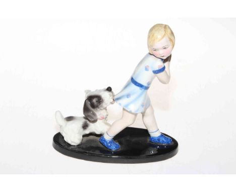 Goldscheider figure of girl playing with dog, impressed No. 6853, 16cm high.