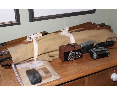 WWII British Army field cot, cameras including Brownies, Voigtlander Perkeo, Traveller, solid silver medal for Faithful Servi