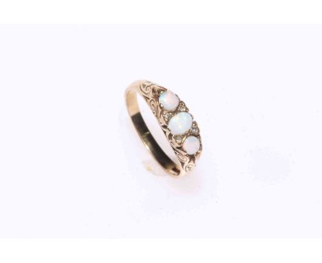 9 carat gold, opal and diamond ring, boxed, size P.