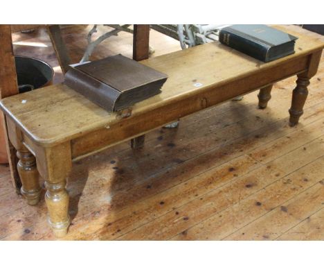 Waxed pine bench on turned legs, 45cm by 156cm.