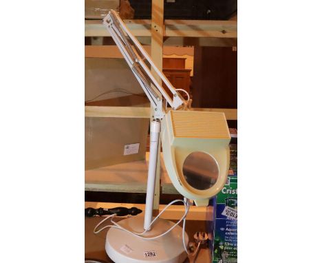 Lighted anglepoise magnifying lamp. Not available for in-house P&amp;P, contact Paul O'Hea at Mailboxes on 01925 659133 Condi