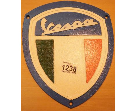 Cast iron Vespa shield, L: 26 cm. P&amp;P Group 1 (£14+VAT for the first lot and £1+VAT for subsequent lots) 