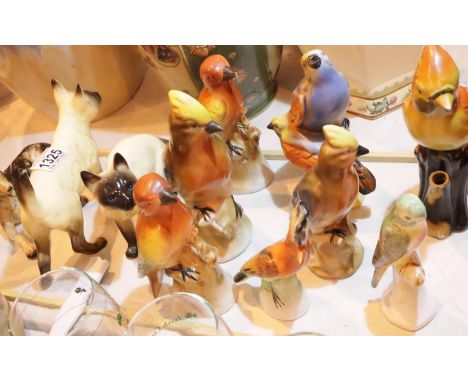 Selection of ceramic birds, two does and two cats. Not available for in-house P&amp;P, contact Paul O'Hea at Mailboxes on 019