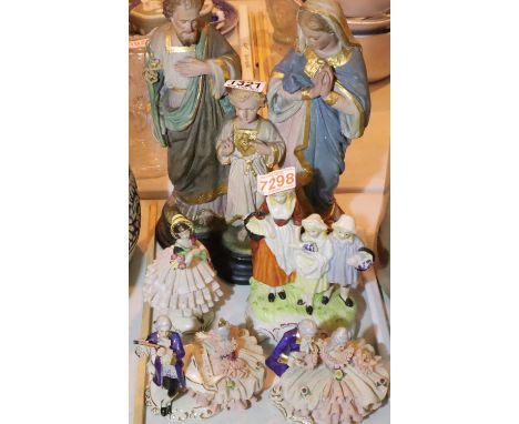 Collection of mixed figures including antique ceramic lace figures and Yardley advertising figures. Not available for in-hous