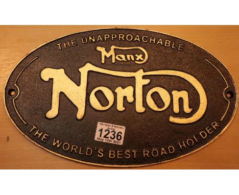 Cast iron Manx Norton sign, L: 33 cm. P&amp;P Group 1 (£14+VAT for the first lot and £1+VAT for subsequent lots) 