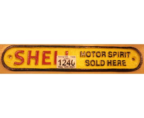 Small cast iron Shell Motor Spirit Sold Here sign, L: 28 cm. P&amp;P Group 1 (£14+VAT for the first lot and £1+VAT for subseq