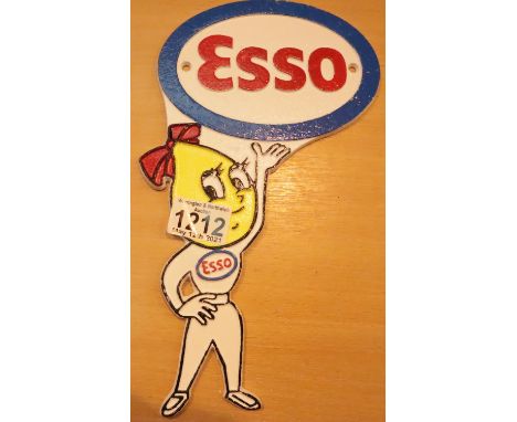 Cast iron Esso girl sign, L: 29 cm. P&amp;P Group 1 (£14+VAT for the first lot and £1+VAT for subsequent lots) 