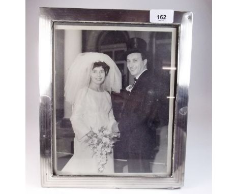 A silver photograph frame with engine turned decoration, Birmingham 1911