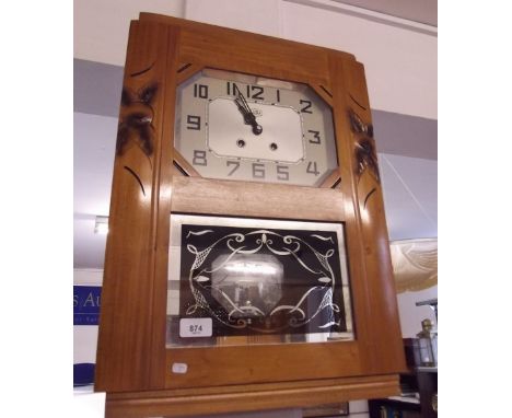 A wooden cased 1950's French Jura wall clock carved Normandy Apples design