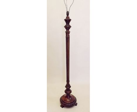 A Victorian mahogany standard lamp with reeded column