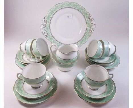 A Salisbury tea service comprising six cups and saucers, six tea plates and sugar, milk and cake plate