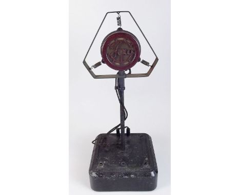 A 1920's battery loudspeaking microphone in red bakelite on cast Mazac base with four volt input and amplifier terminals and 