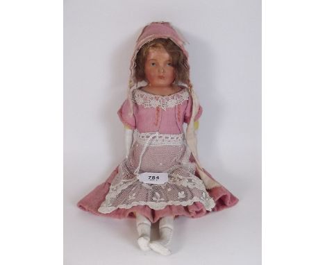 A Victorian composition and bisque doll 31cm