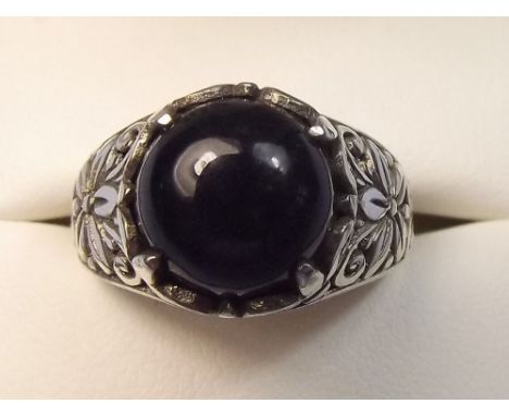 A black jade and silver ring