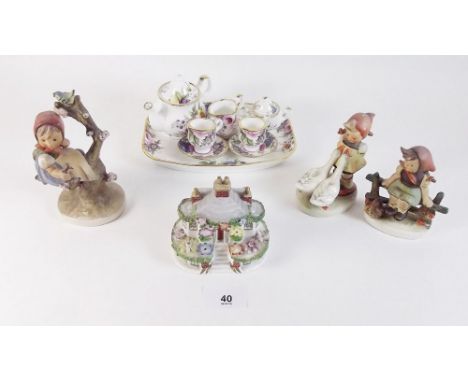 Three Hummel figures (one with tiny chip), a Coalport pastille burner and various miniature tea ware