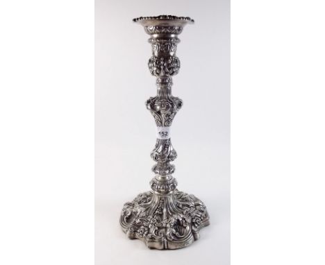 A silver Rococo style candlestick with all over floral and shell design by Walker and Hall, Sheffield 1903