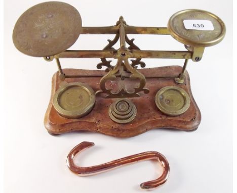 A Victorian set of old postal scales and weights with engraved decoration and a copper butchers hook