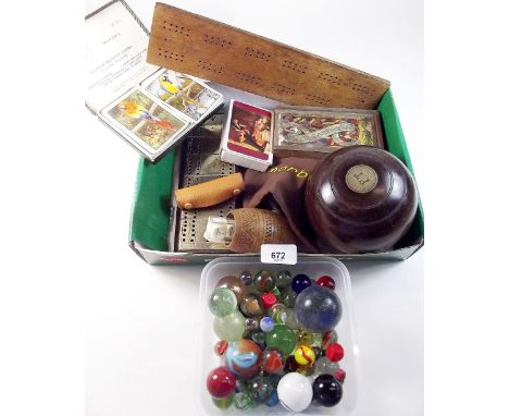 A box of games items including 1930's Riley of Accrington 3 Bias Bowl, two cribbage boards, two poker dice sets, playing card