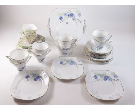 A Phoenix part tea set comprising: six cups and saucers, six side plates, milk, sugar and cake plate and two CWS Windsor chin