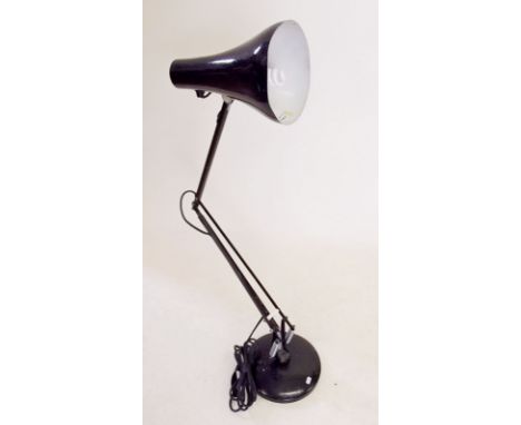 A vintage black anglepoise lamp