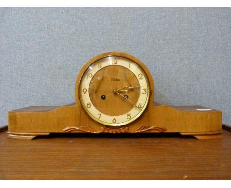 An Art Deco walnut mantel clock 