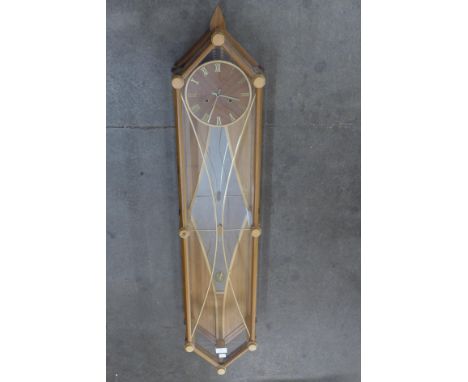 A scratch built teak cased wall clock 
