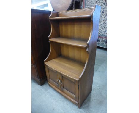 An Ercol Golden Dawn ash open bookcase 