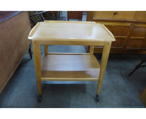 A Remploy light oak trolley 