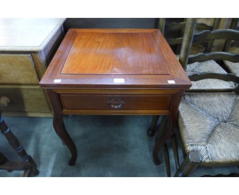 A Chinese hardwood single drawer lamp table 