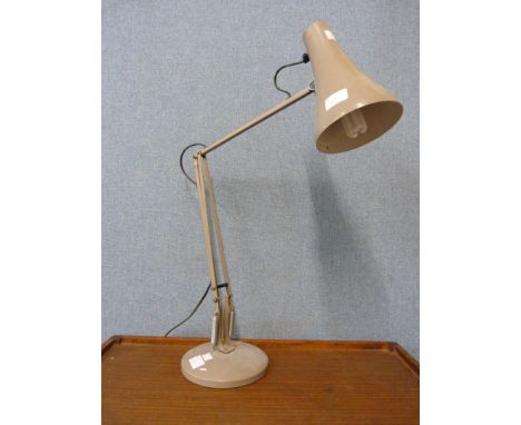 A grey metal anglepoise desk lamp 