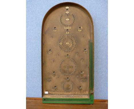 A vintage bagatelle board 