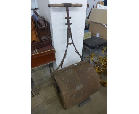 A cast iron garden roller 