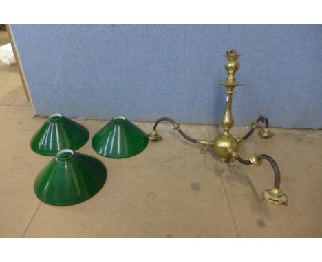 A brass and steel chandelier 