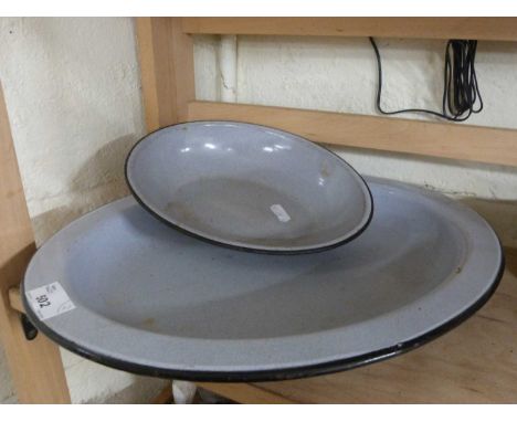 Two enamel oval dishes