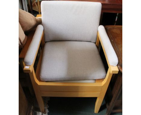 An upholstered Care Co 'Alton' design commode chair, maximum weight 22 stones