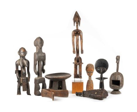 A collection of African ethnographica, comprising a Dogon seated female figure, 60.5cm (excluding wood base); a Turkana headr