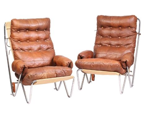 A pair of 'mid-century vintage' Italian tubular chrome cantilever armchairs, 1970s (?) with tan patchwork and buttoned, suspe