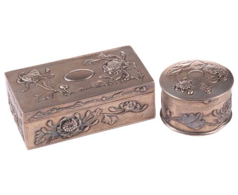 Two Chinese silver dressing table boxes, Hung Chong &amp; Co, circa 1900, of rectangular and circular form, each with an oval