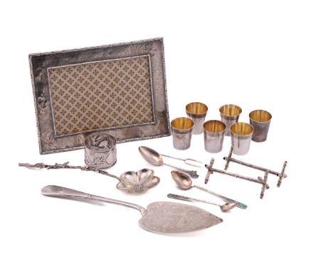 A collection of Chinese silver and white metal wares, comprising a prunus flower serving spoon by Luen Wo, 21cm; a cake slice