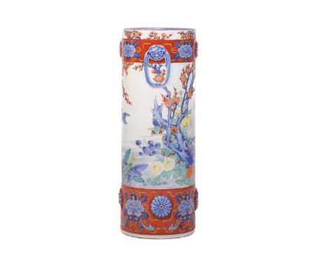 A large Japanese Fukagawa cylindrical porcelain stick stand, Meiji, late 19th century, painted with white cranes wading amids