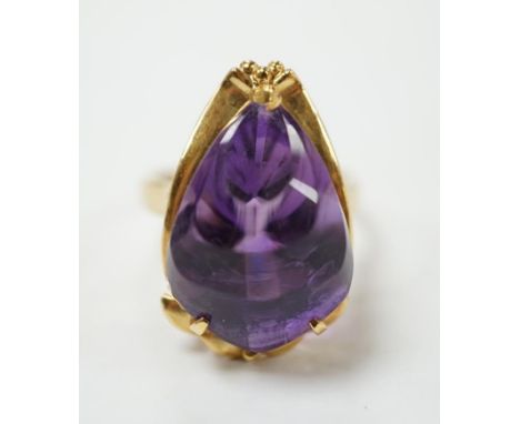 A modern 18k and singe stone fancy pear cut amethyst set dress ring, size L, gross weight 7.1 grams. Condition - good