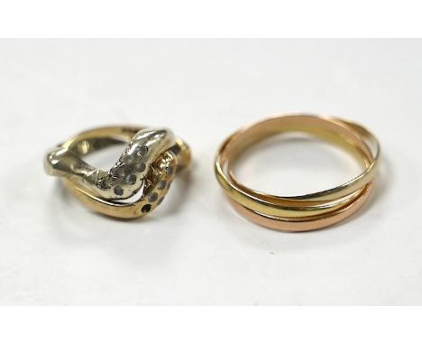 An Italian three colour 750 yellow metal 'Russian' wedding ring, size U/V, 3.6 grams, together with a two colour 9ct gold and
