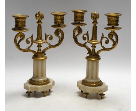 A pair of late 19th century alabaster and gilt metal two light candelabra, 22cm. Condition - good