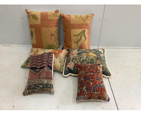 Six various tapestry and rug fabric covered cushions, largest 64 x 46cm. Condition - good