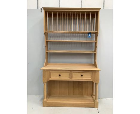 A modern bespoke light oak dresser, width 135cm, depth 50cm, height 227cm. Condition - good